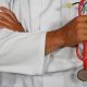 Medical professional with a stethoscope specializing in the causes and risks of heart failure.